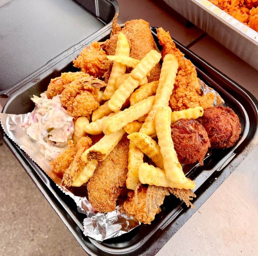 2 Cat Combo — two whole catfish with shrimp, chicken, and sides