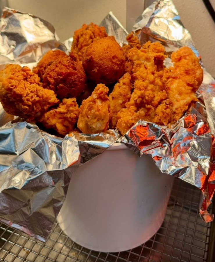 Chicken bucket — fried chicken tenders and hushpuppies