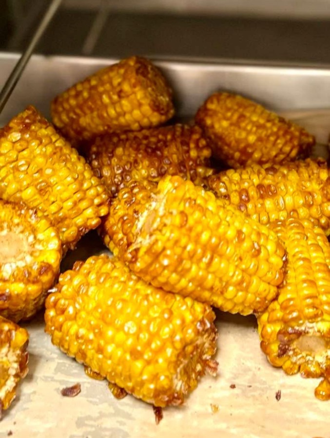 Corn on the cob deep-fried until golden