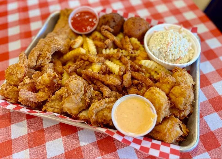 The Platter — shrimp, oysters, scallops, catfish, clam strips, fries, and hushpuppies